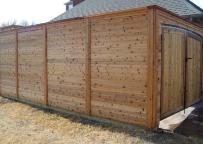 Sturdy cedar fence crafted by Spring Creek Fence and Gate experts