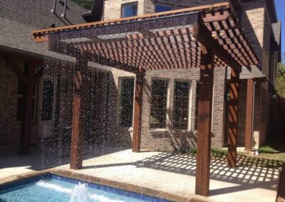 Elegant patio pergola design by Spring Creek Fence and Gate