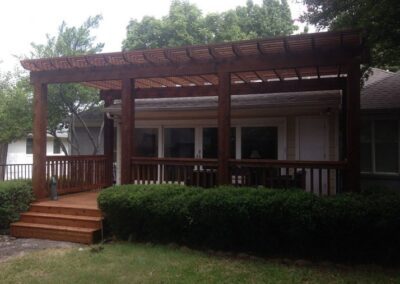 Elegant patio pergola design by Spring Creek Fence and Gate