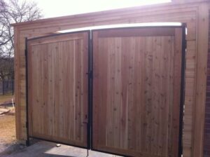 Stylish Wood Drive Gate Installation by Spring Creek Fence and Gate, Fencing in Dallas