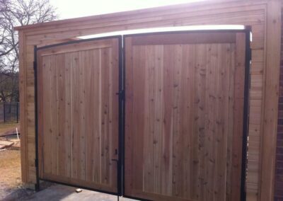 Stylish Wood Drive Gate Installation by Spring Creek Fence and Gate, Fencing in Dallas