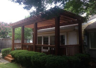 Expertly Crafted Wooden Pergola on Patio - Spring Creek Fence and Gate